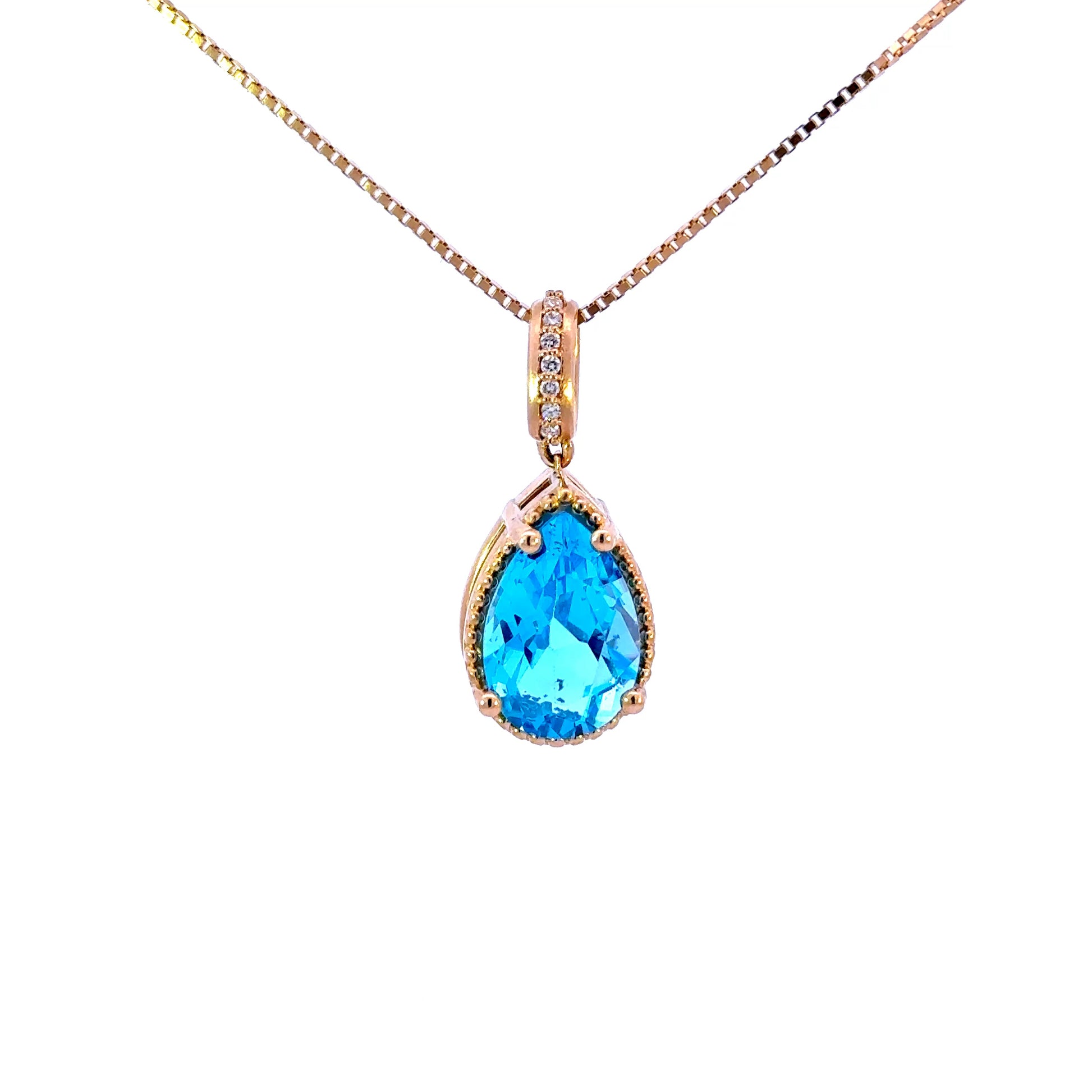 14k Pear London Blue Topaz Pendant