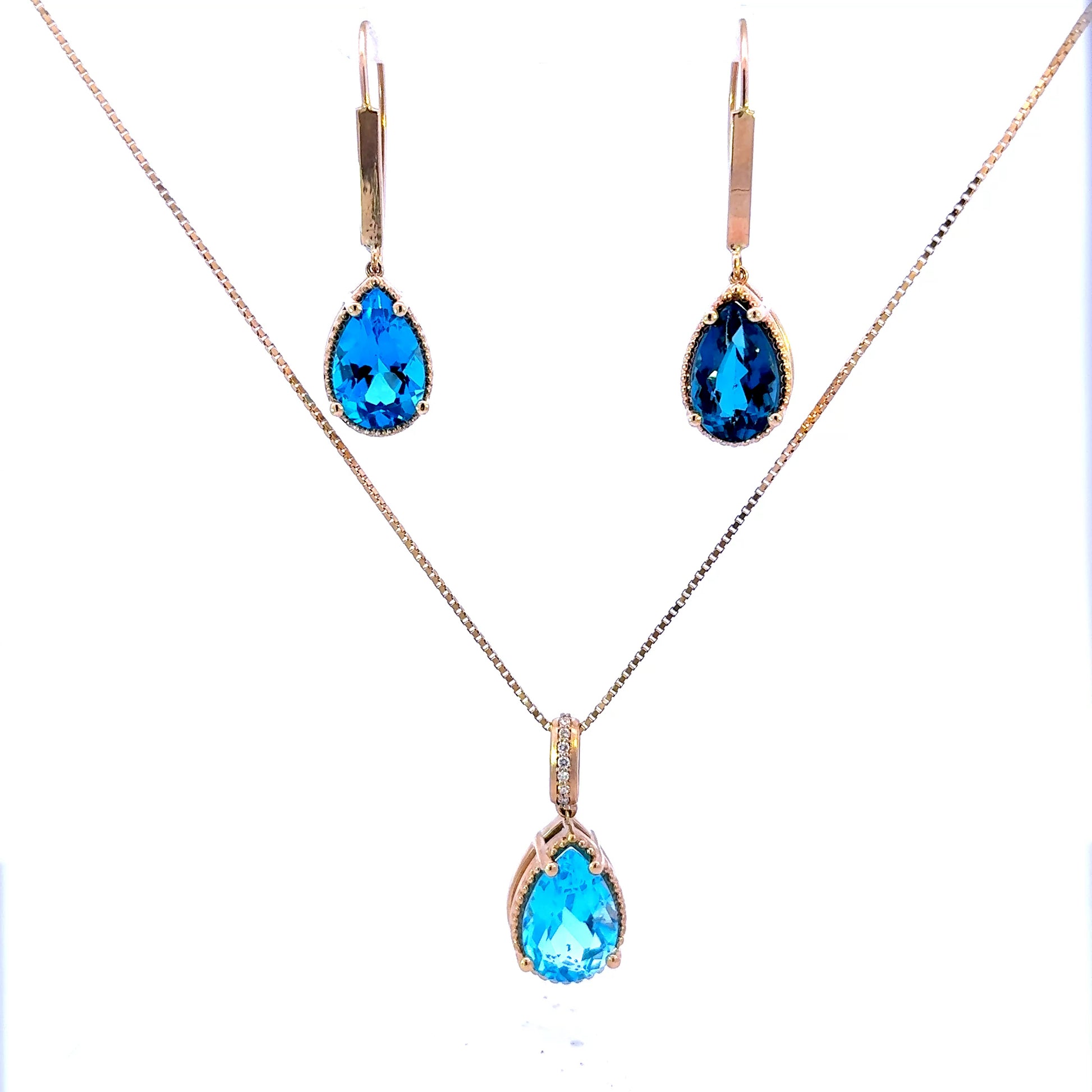 14k Pear London Blue Topaz Earrings