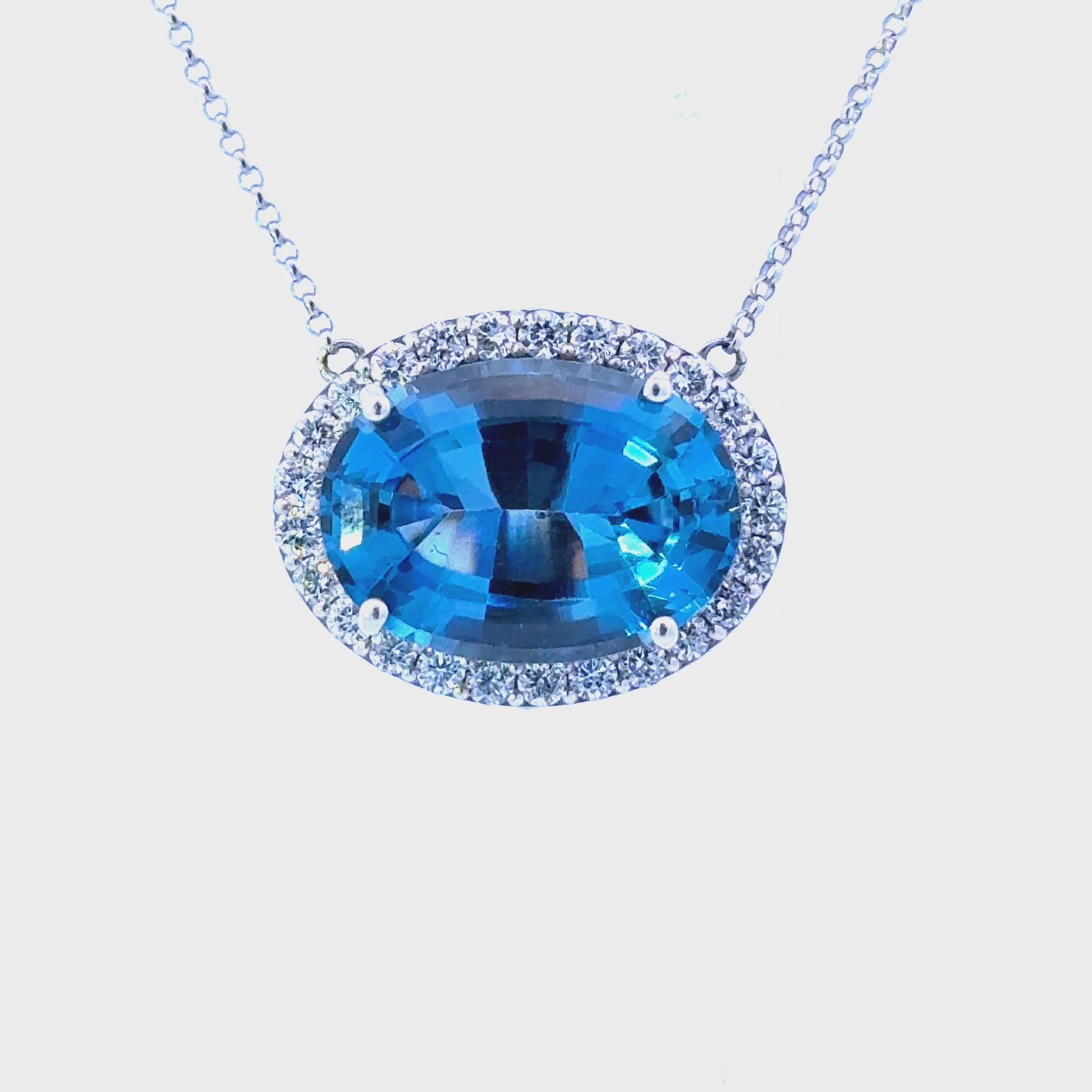 14k Blue Topaz Pendant